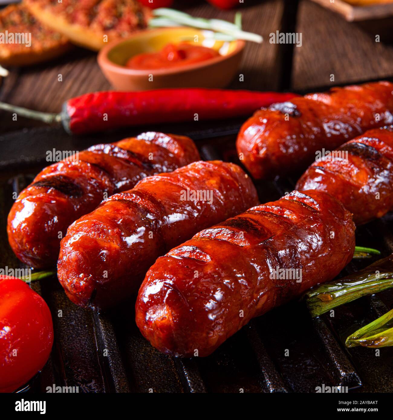Chili chorizo sausage with tomato bruschetta Stock Photo - Alamy