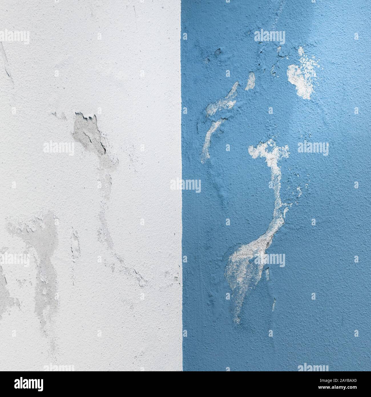 Paint peeling off from the wall Stock Photo