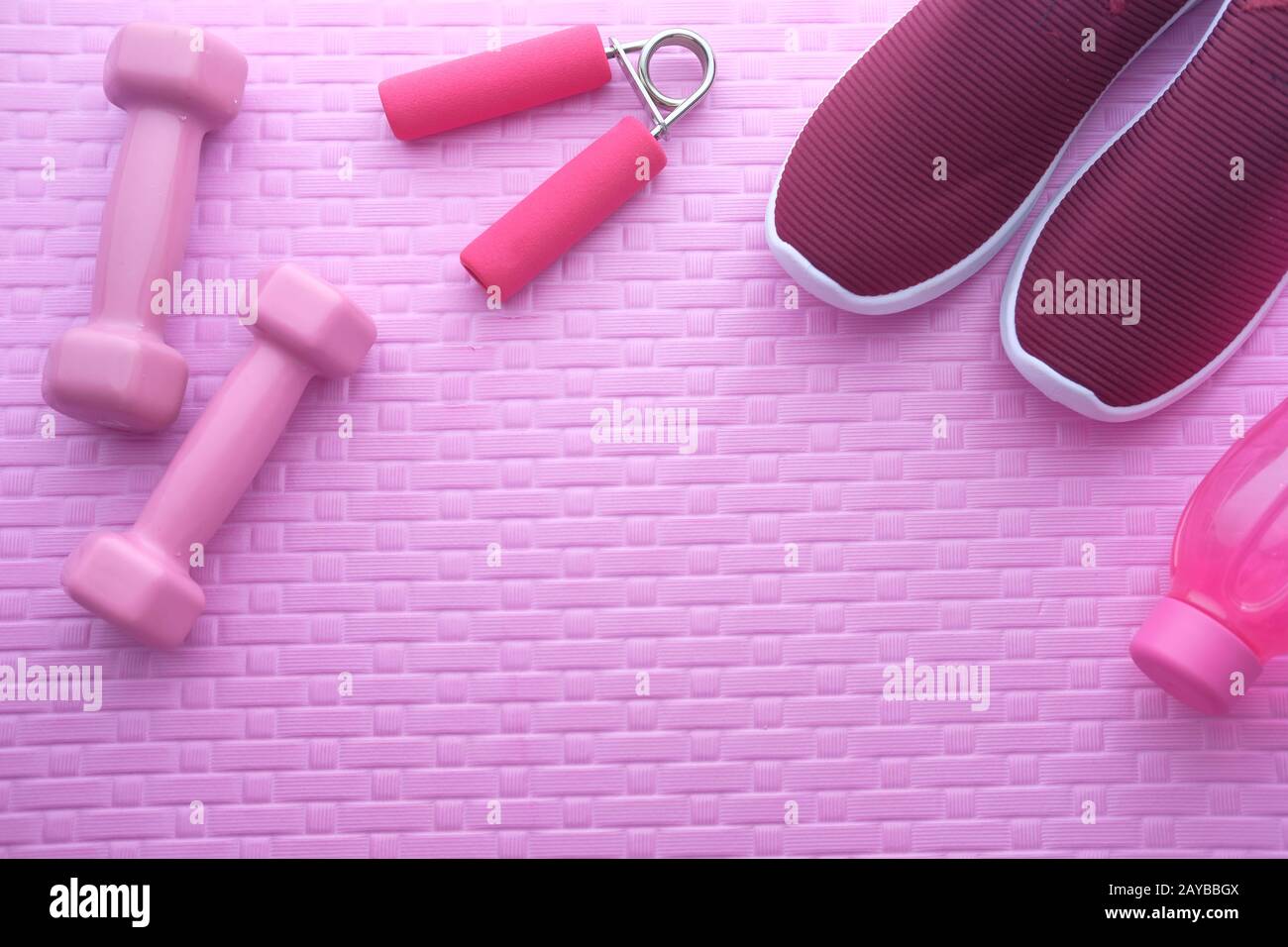 top view of dumbbell and shoe on exercise mat Stock Photo Alamy