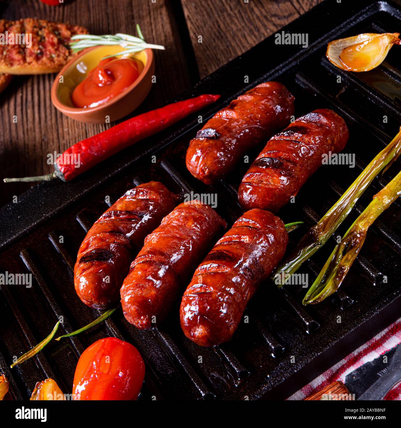 Chili chorizo sausage with tomato bruschetta Stock Photo Alamy