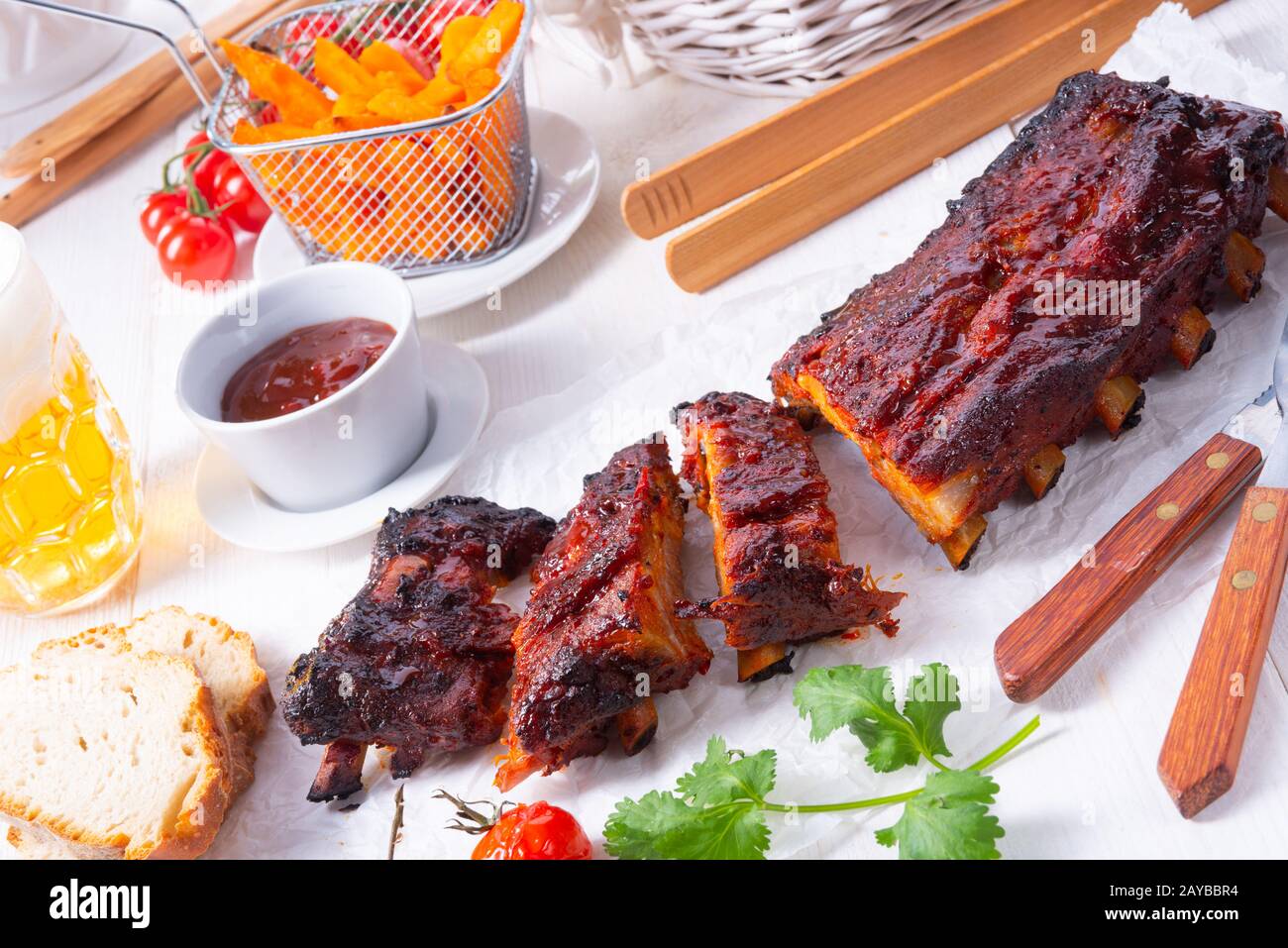 BBQ Spare Ribs From A Charcoal Grill Stock Photo Alamy bbq-spare-ribs-from-a-charcoal-grill-stock-photo-alamy