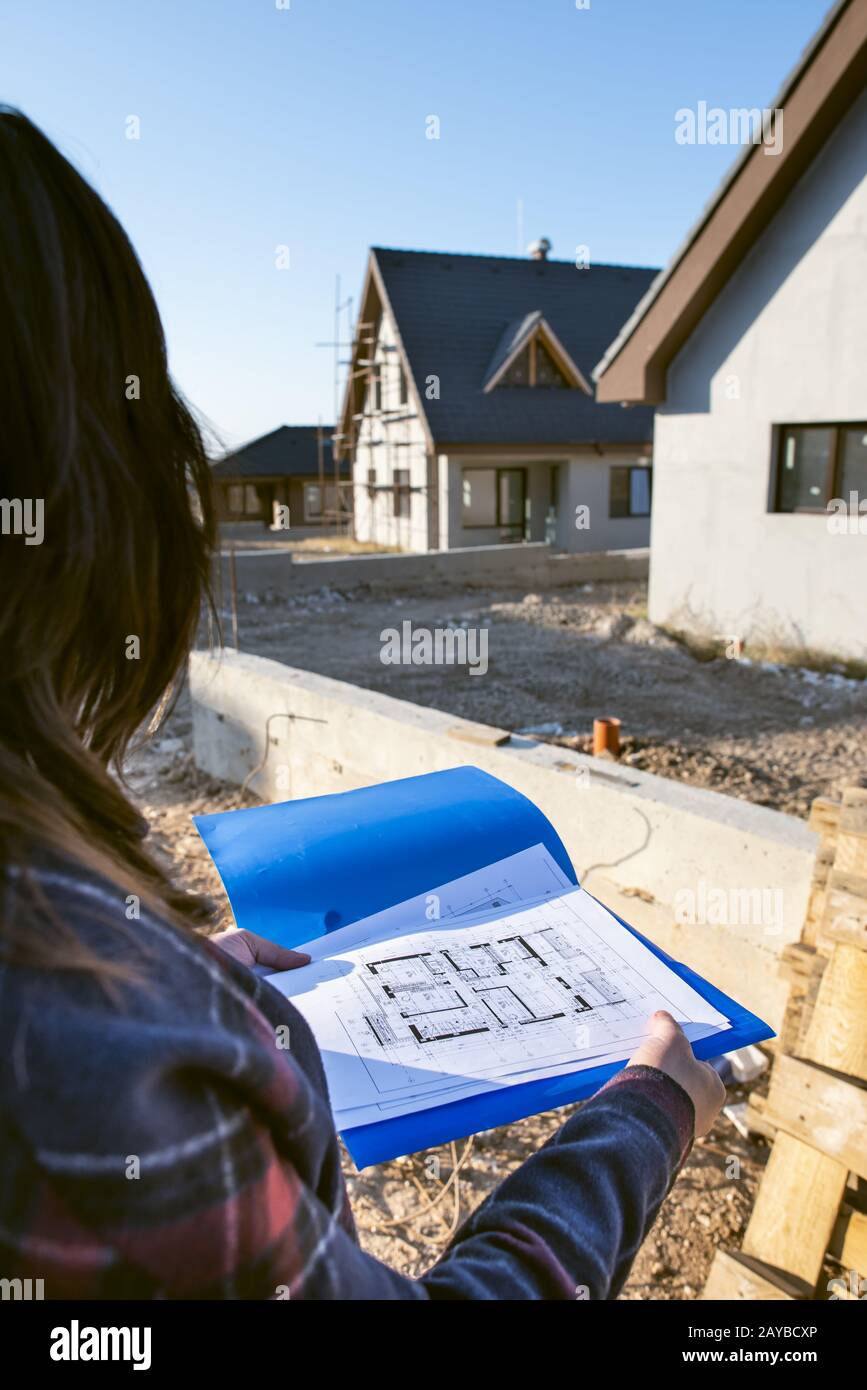 new-build-house-and-blueprints-stock-photo-alamy