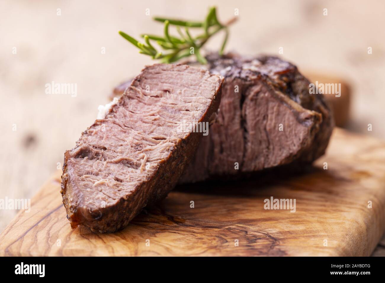 grilled juicy steak on olive wood Stock Photo Alamy