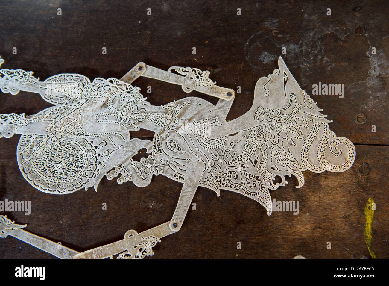 Close-up of an unpainted traditional Javanese wayang kulit (shadow puppet) made out of leather in Yogyakarta, Java, Indonesia. Stock Photo