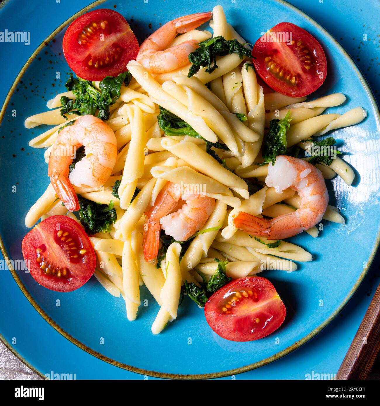 strozzapreti pasta with spinach and shrimp Stock Photo Alamy