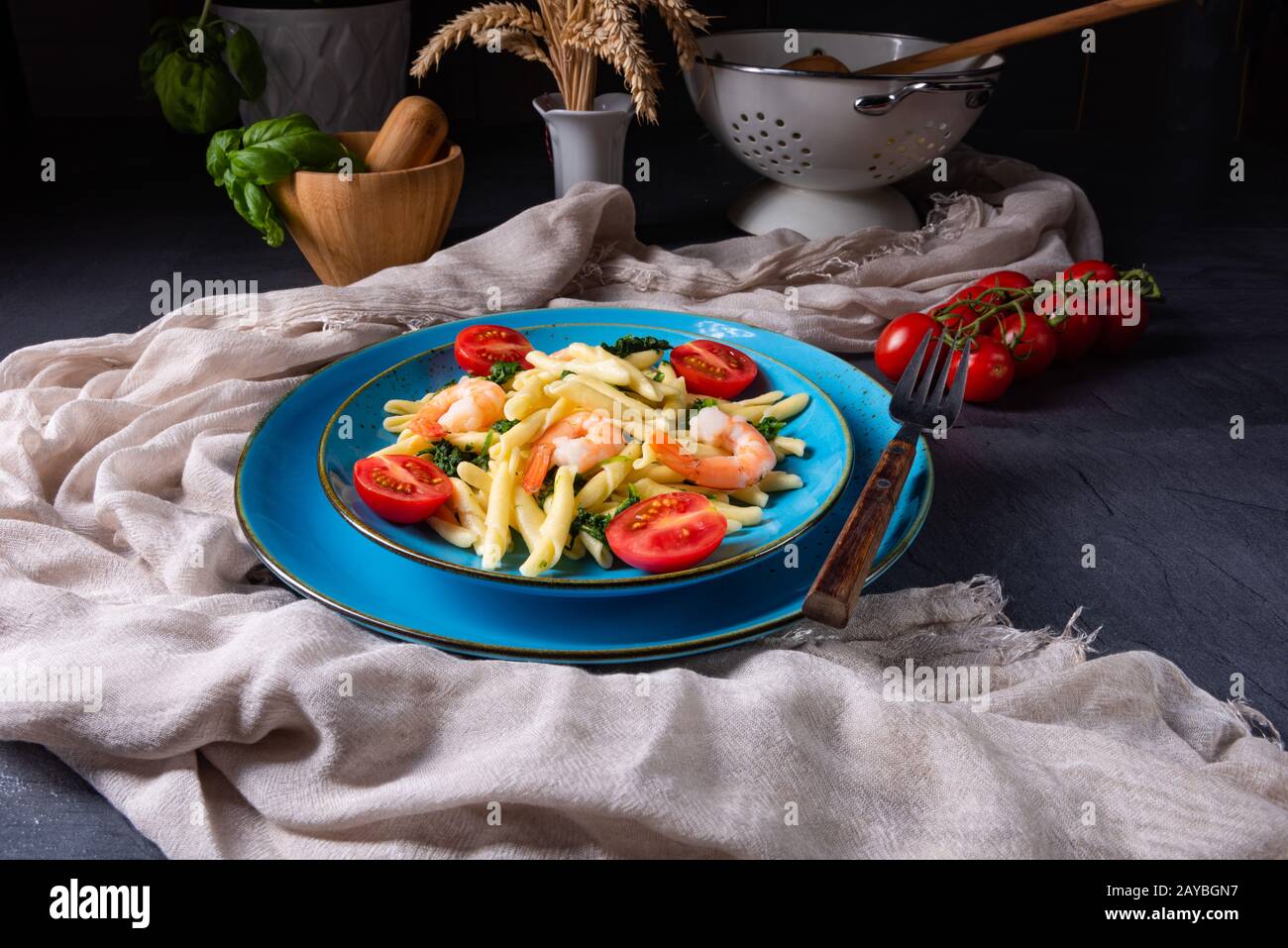 strozzapreti pasta with spinach and shrimp Stock Photo - Alamy