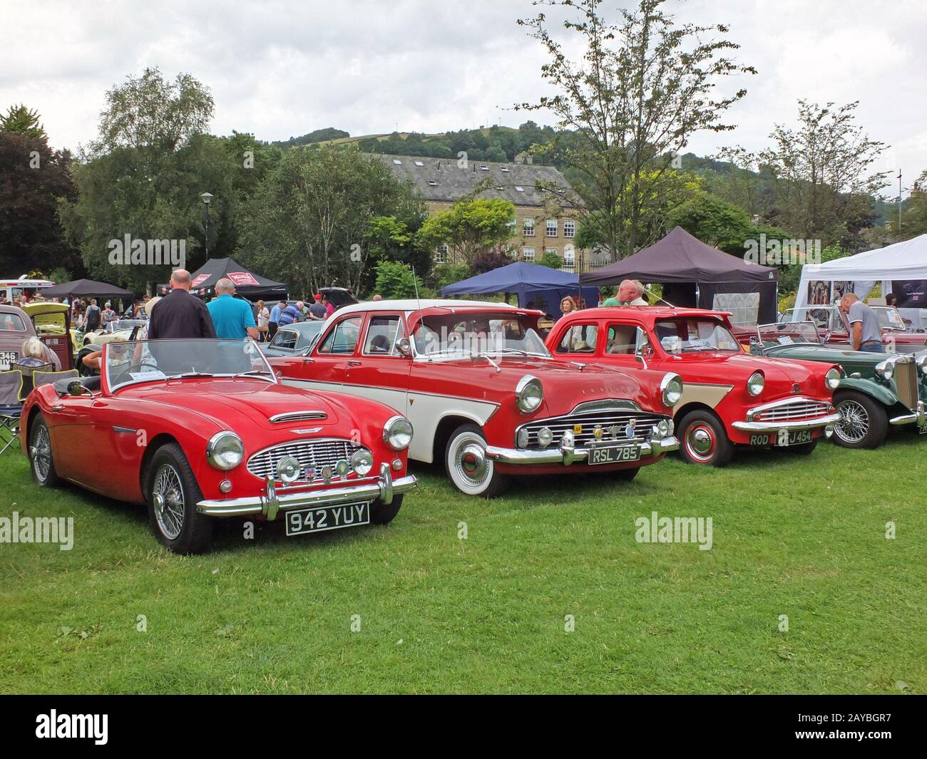 people looking at cars in the public park at hebden bridge annual vintage weekend Stock Photo