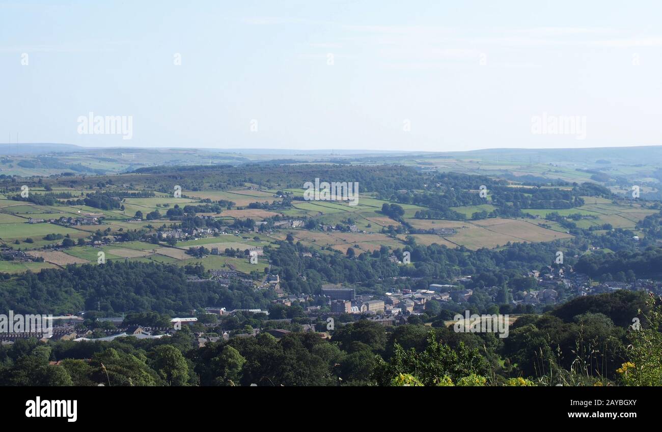 a panoramic view of the countryside around sowerby bridge in west yorkshire with buildings of the town surrounded by farms and f Stock Photo
