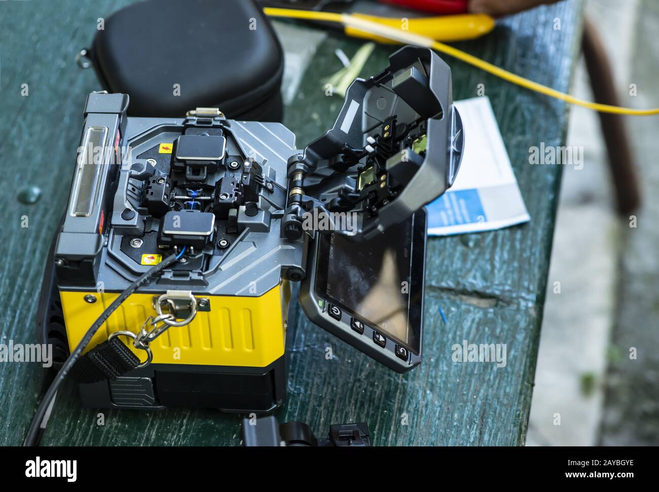 Device for mounting optical cable. Optical internet Technology concept. Stock Photo