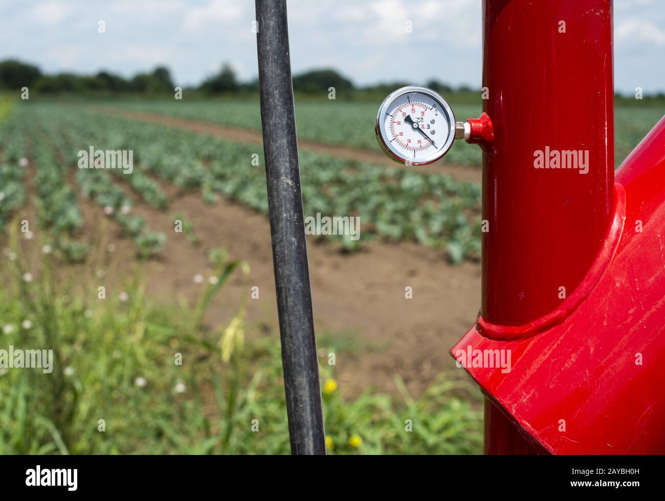 Water pump and pipes on farmland Stock Photo Alamy
