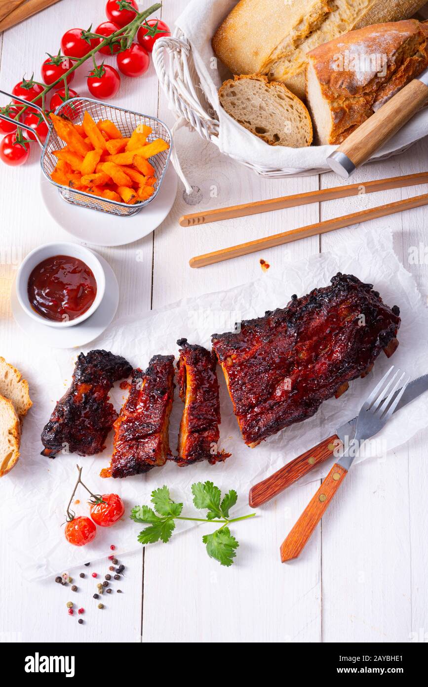 BBQ spare ribs from a charcoal grill Stock Photo - Alamy