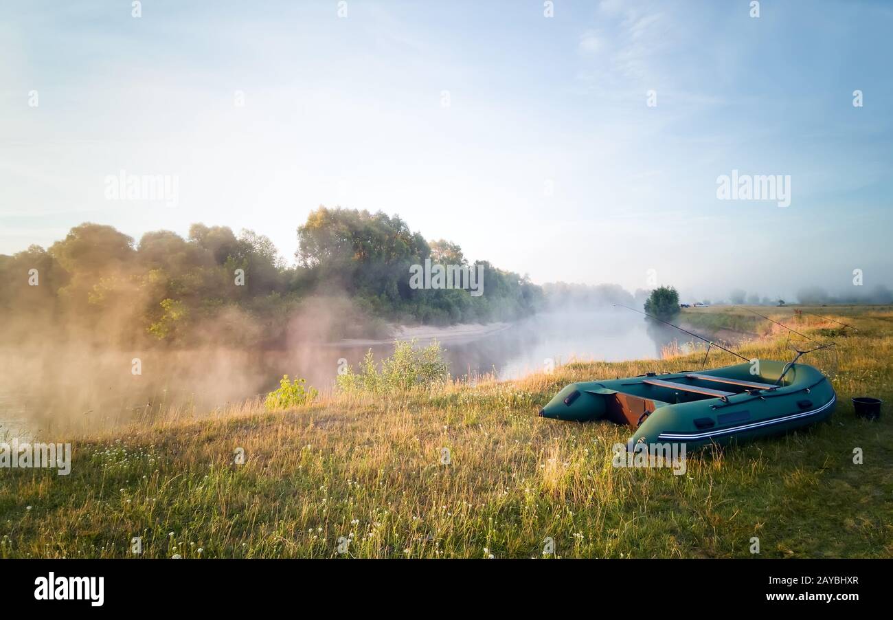 Morning landscape with fog over the river Stock Photo - Alamy