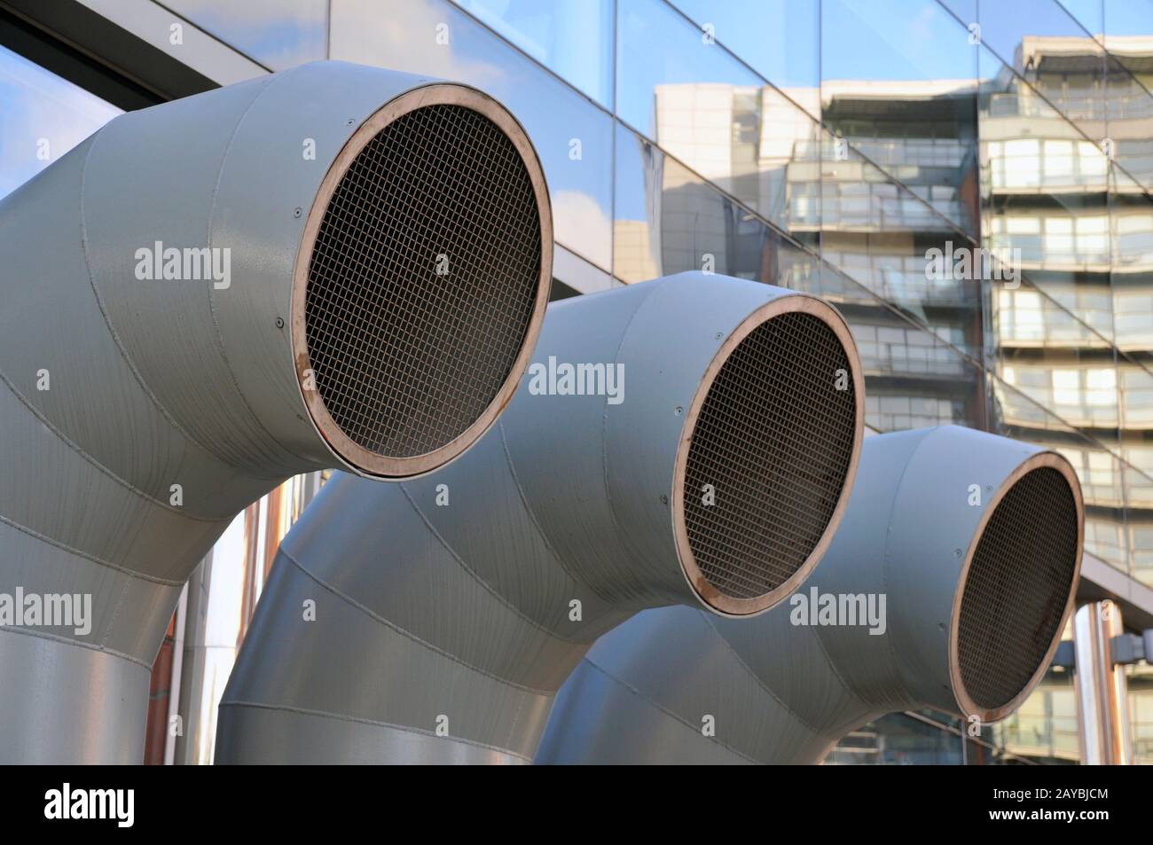 funnel shaped ventilation ducts on a modern building Stock Photo