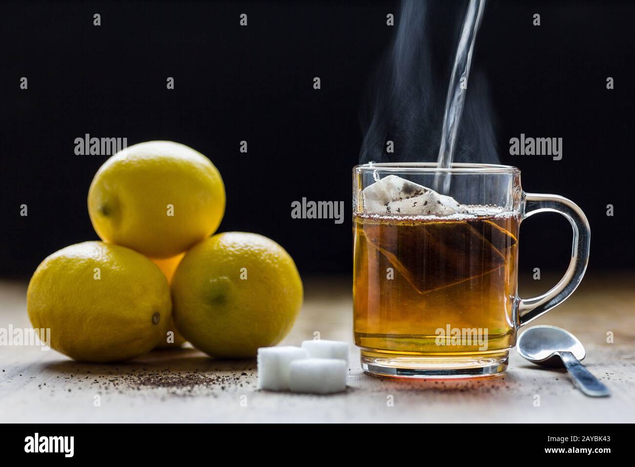 Preparing hot black tea with lemons. Relaxation ,breakfast and health