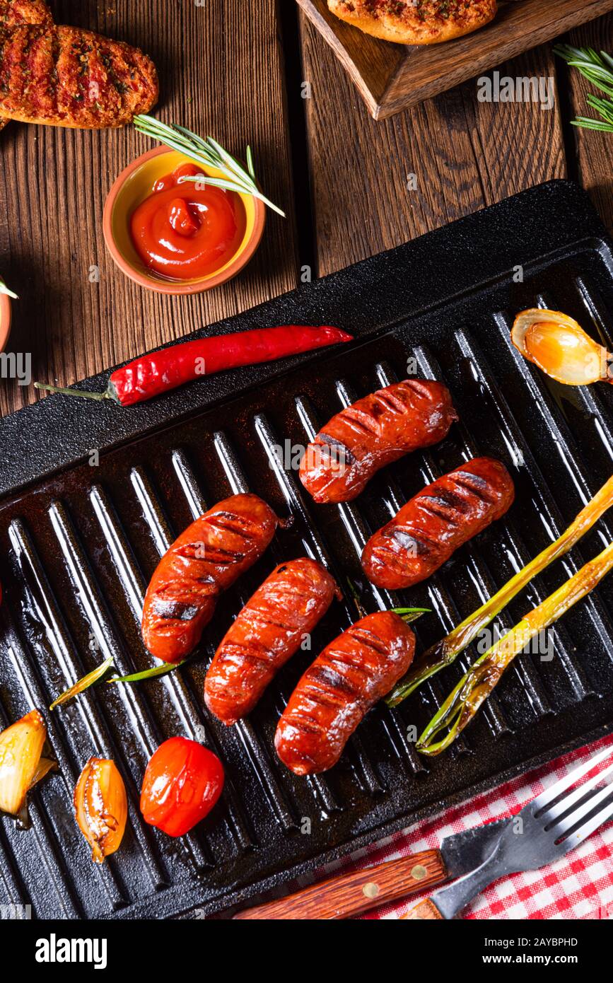 Chili chorizo sausage with tomato bruschetta Stock Photo - Alamy
