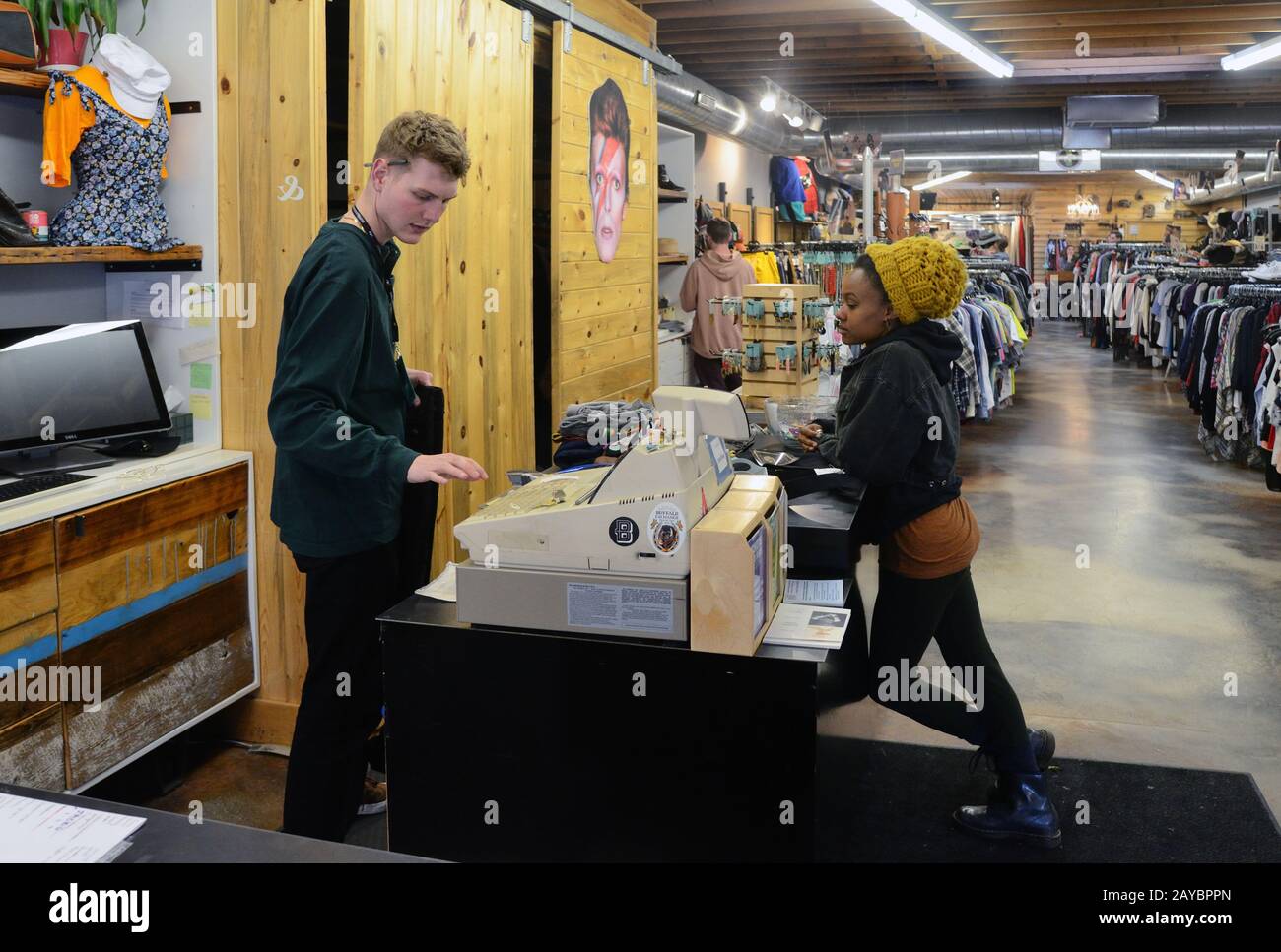 Shoppers at Buffalo Exchange, a recycled clothing store on East Pearl St. in Boulder Stock Photo