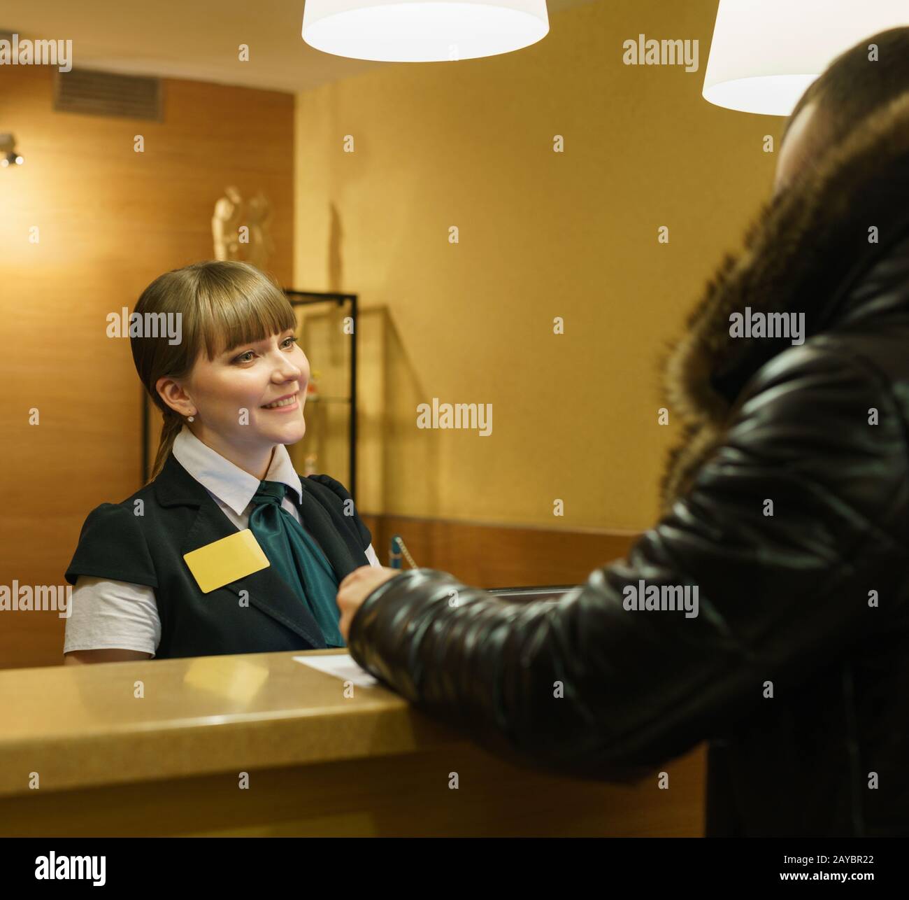 Welcoming customer hi-res stock photography and images - Alamy