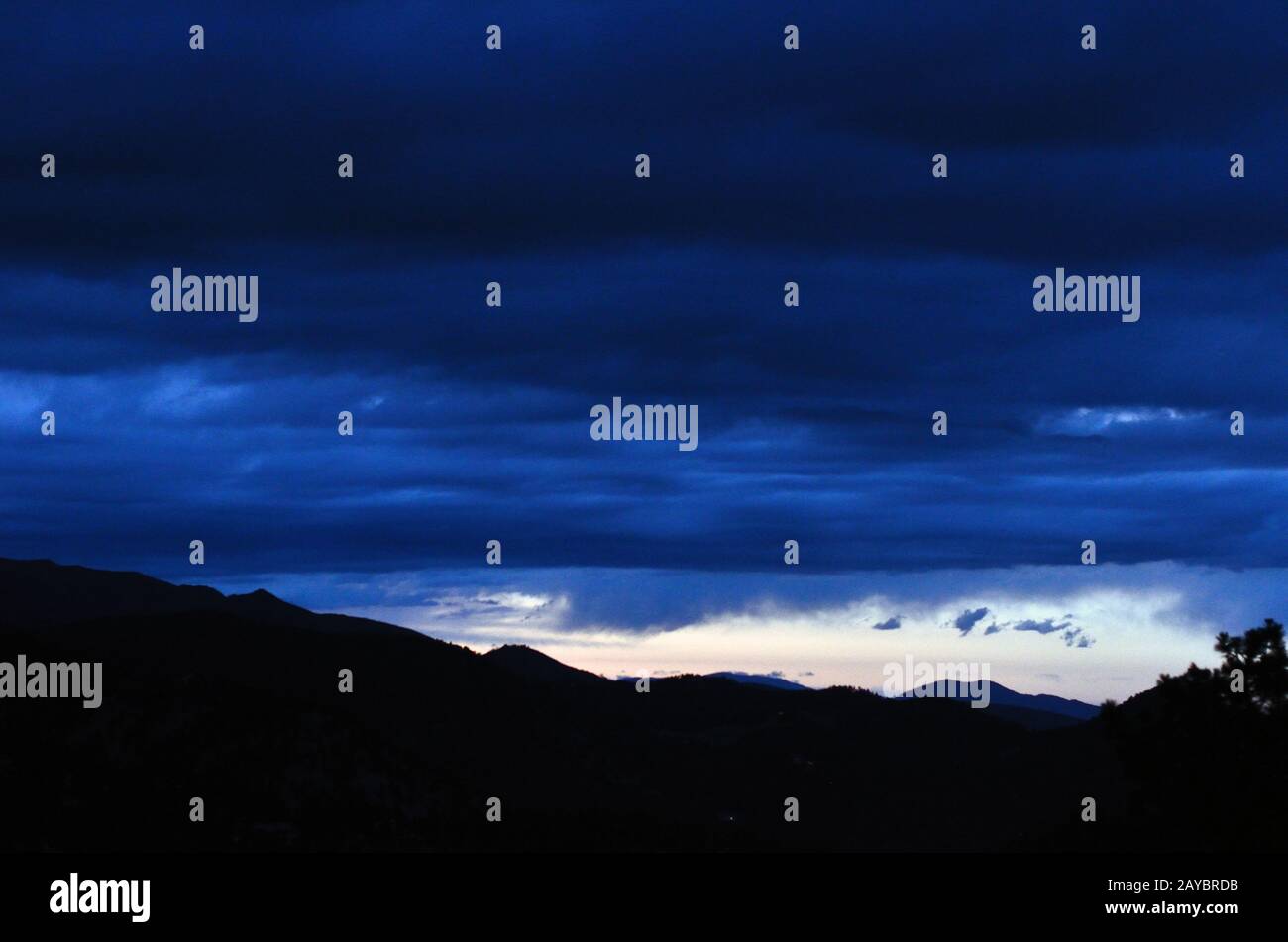 Clouds after sunset, Rocky Mountain foothills, near Boulder, CO Stock Photo