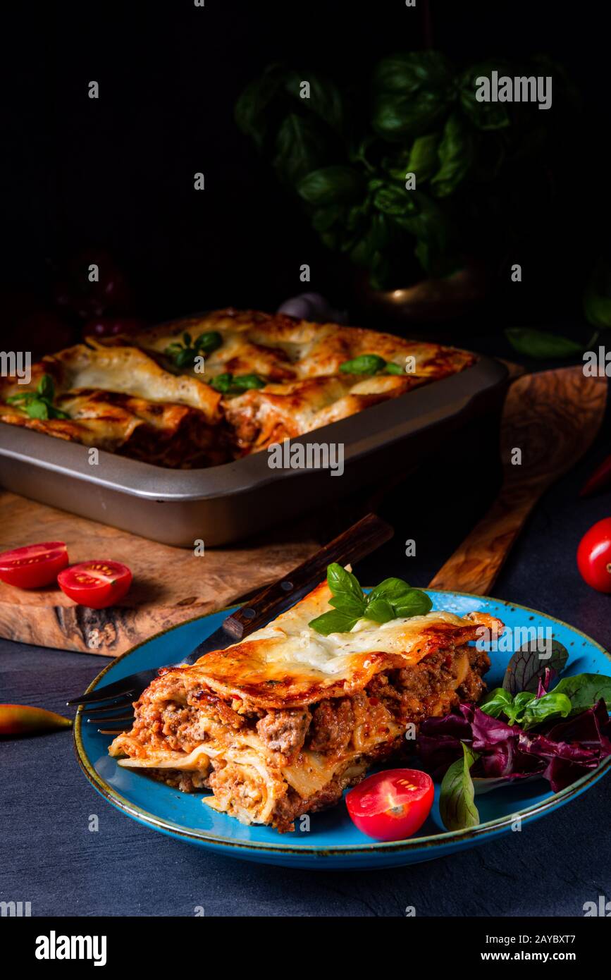 spicy lasagne with tomato sauce and basil Stock Photo Alamy