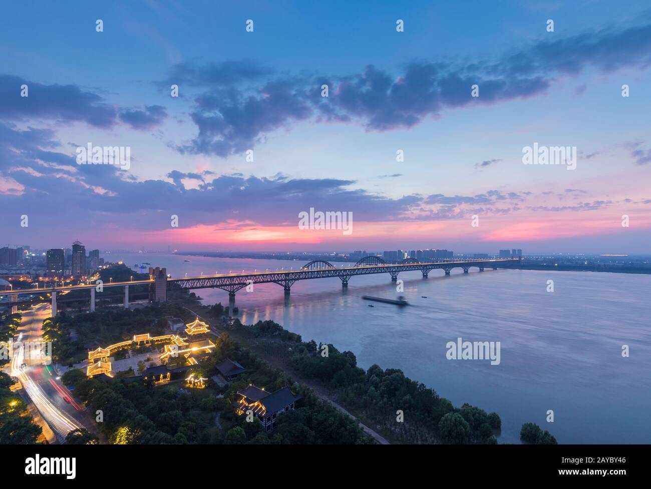 jiujiang yangtze river bridge in night falls Stock Photo