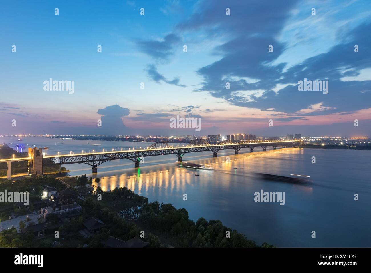 jiujiang combined bridge in nightfall Stock Photo