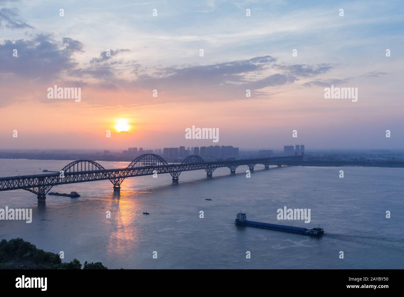 jiujiang yangtze river bridge in sunset Stock Photo