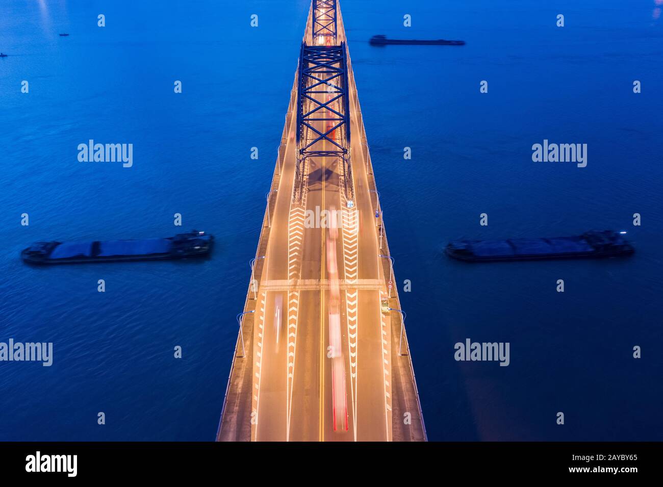 bridge on river closeup in nightfall Stock Photo