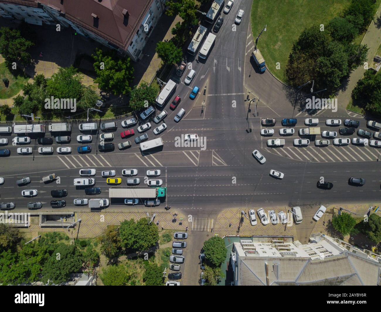 Aerial road abstract: top down view of urban city traffic at rush hour ...