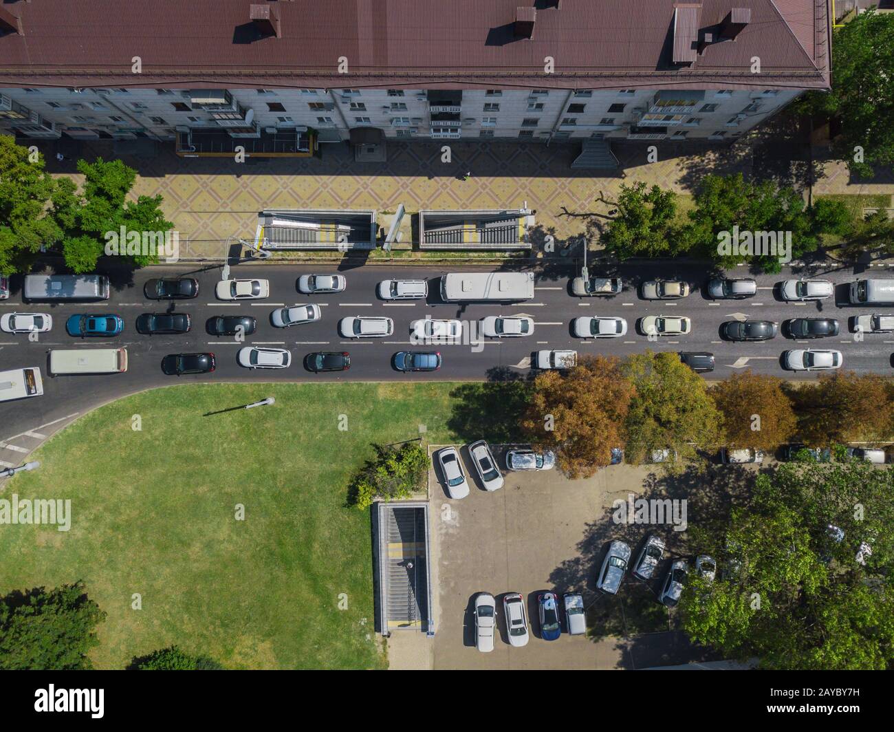Aerial road abstract: top down view of urban city traffic at rush hour, transportation concept. Stock Photo
