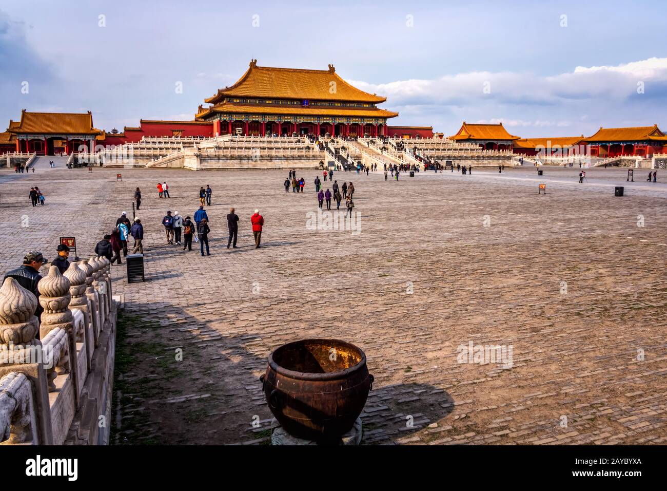 Multiple tourists visiting Forbidden City, front view on central square and temples Stock Photo