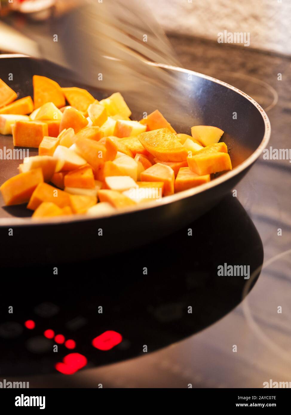 Cooking vegetables on a stove Stock Photo Alamy