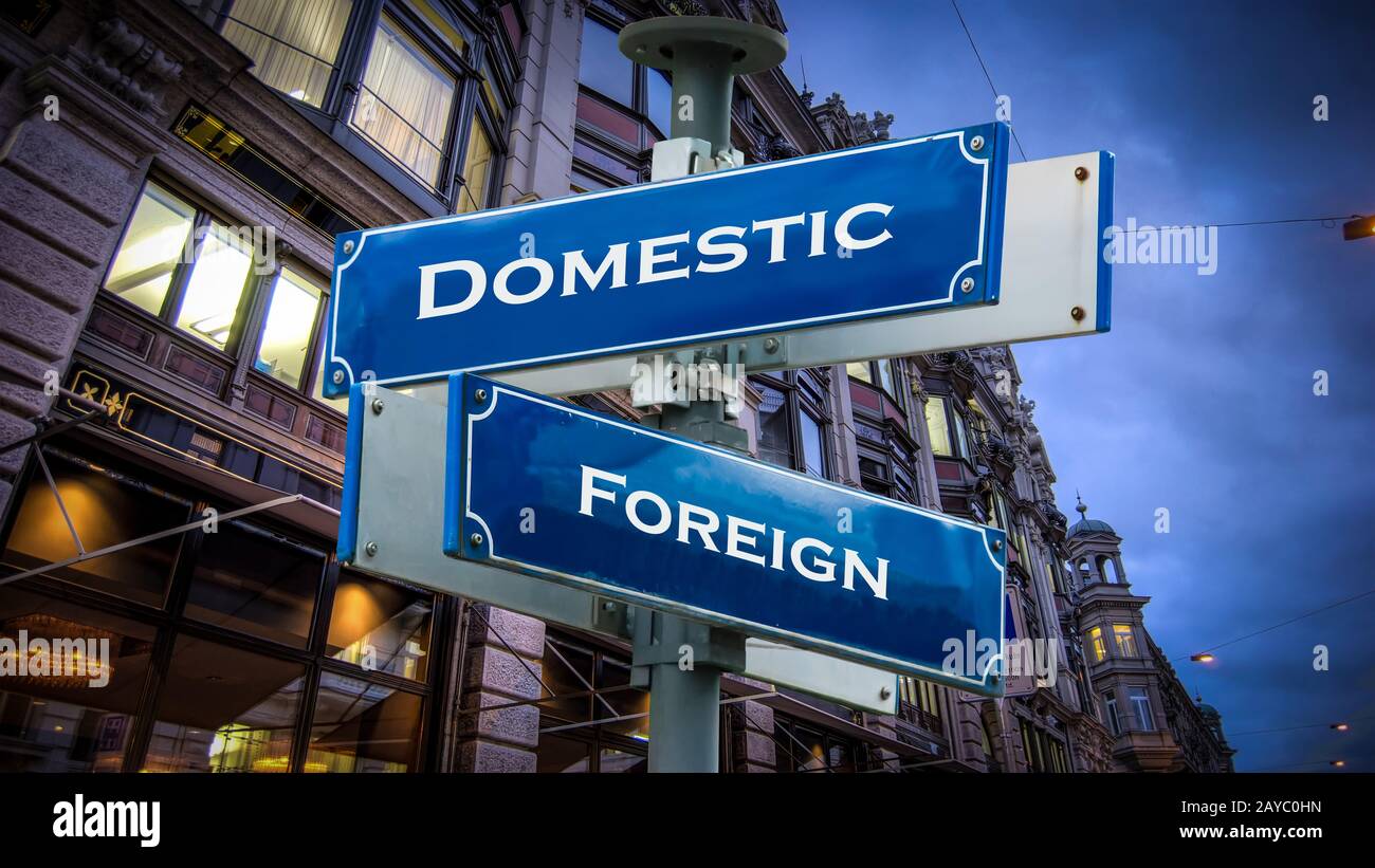 Street Sign Domestic versus Foreign Stock Photo