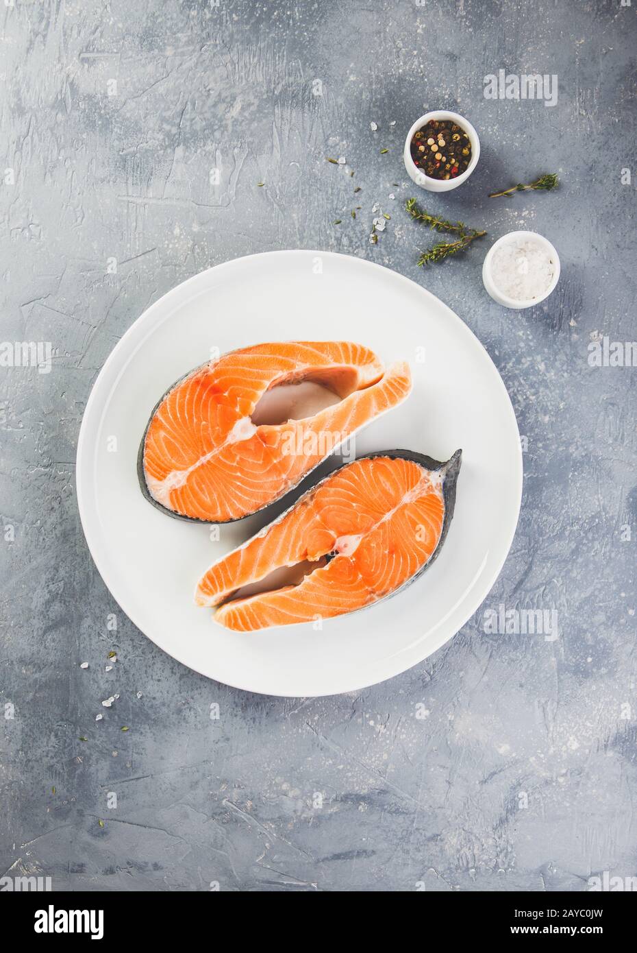 Two fresh raw salmon steaks Stock Photo - Alamy