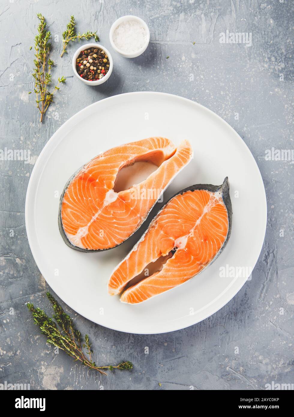 Two fresh raw salmon steaks Stock Photo - Alamy