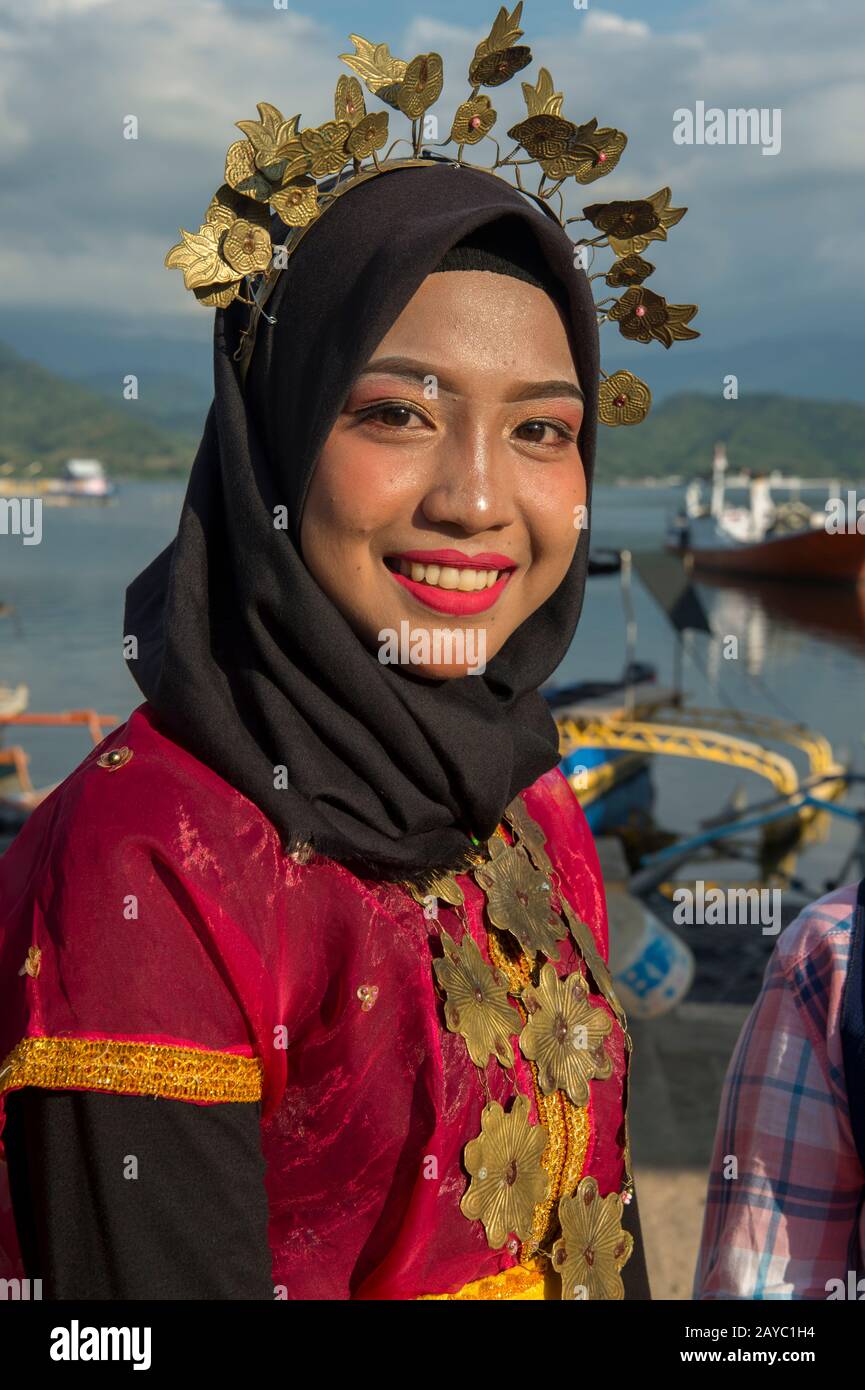 Portrait of a young Bajau woman at a traditional dance performance on Bungin Island, off the coast of Sumbawa Island, Indonesia, home to a group of Ba Stock Photo