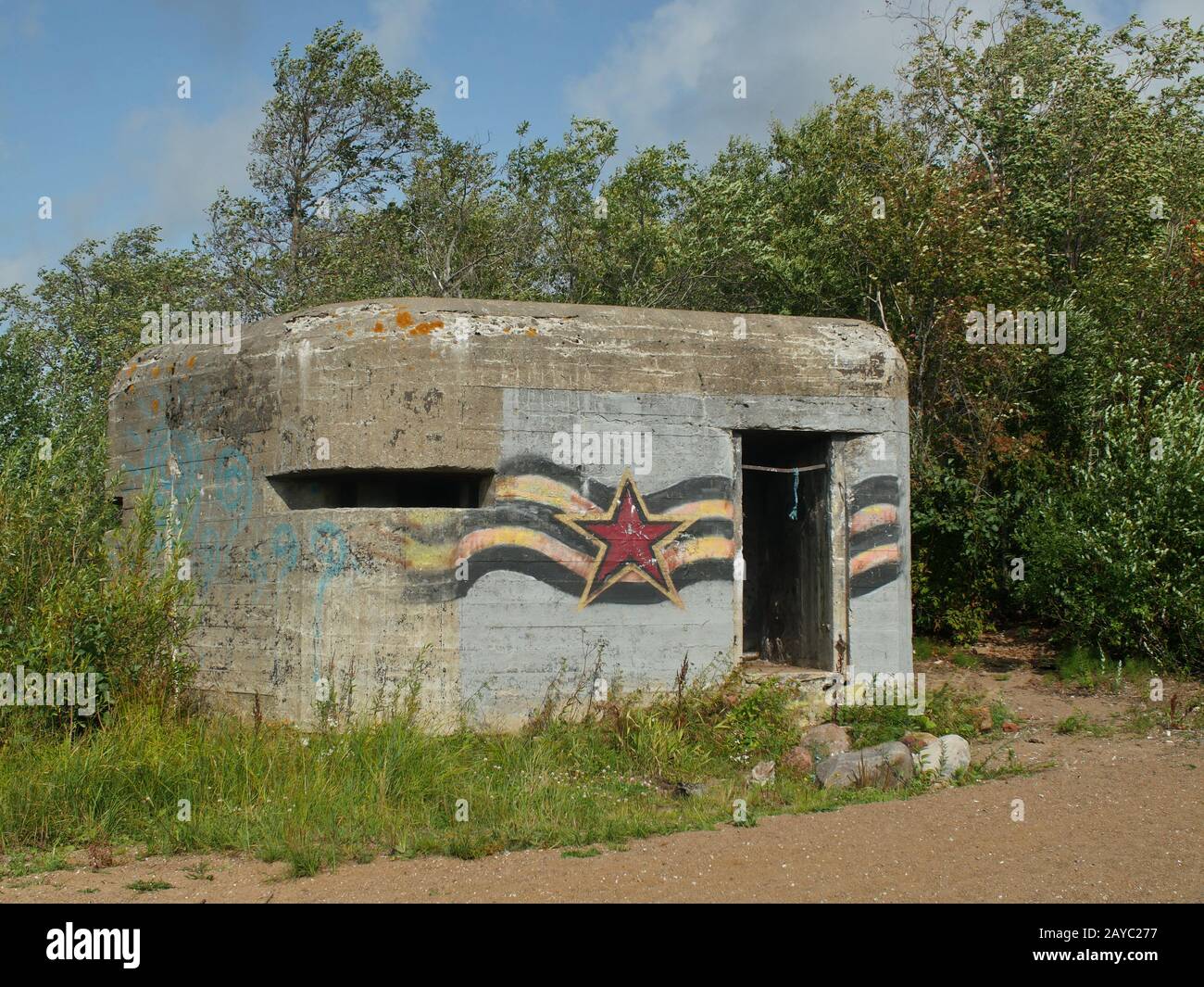 Old soviet military pillbox with graffiti Stock Photo