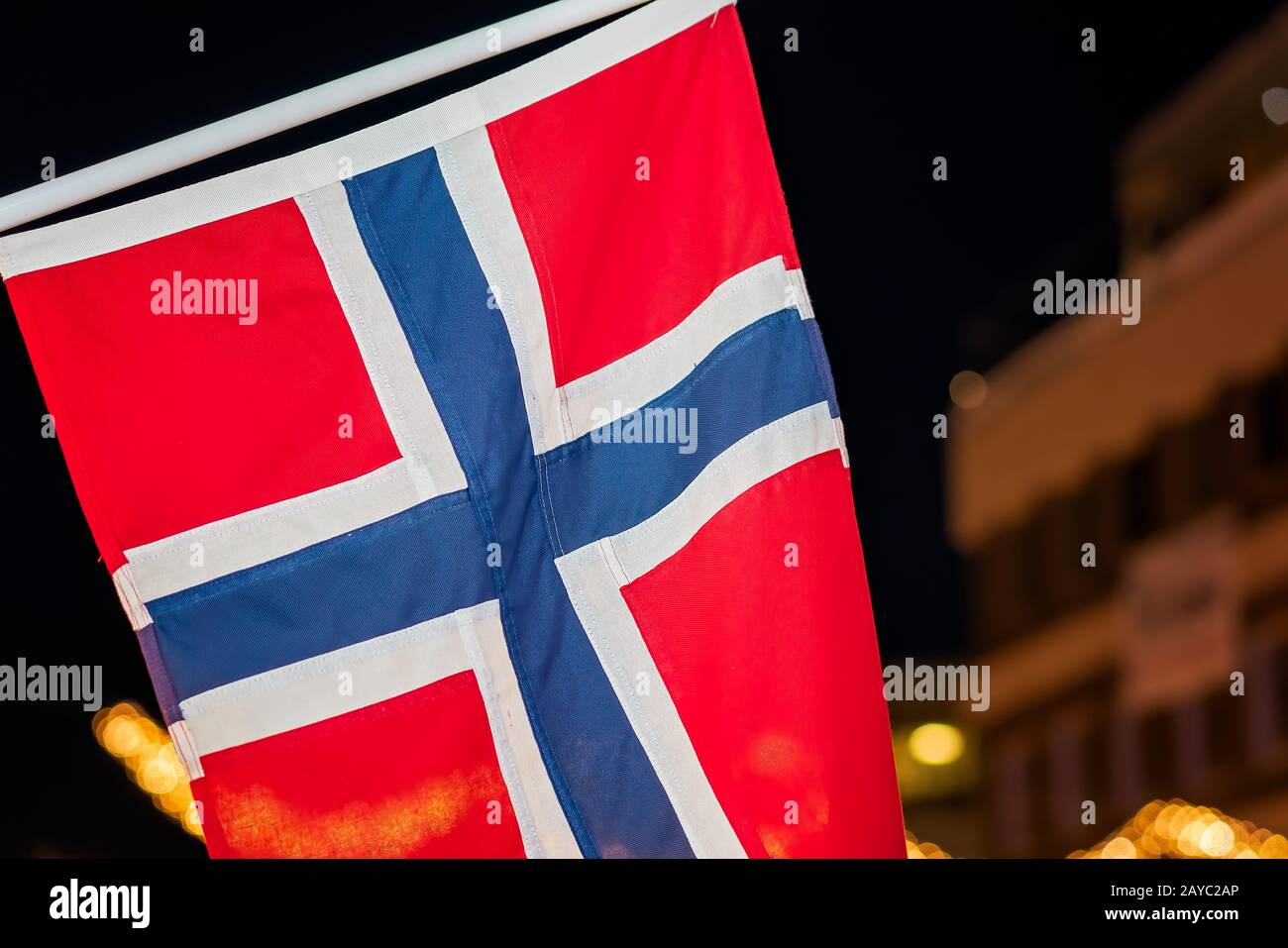Norwegian flag in Tromso at night Stock Photo