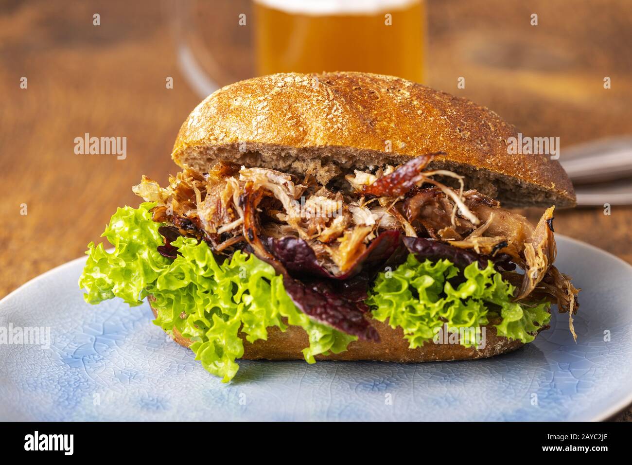 pulled pork in a roll with beer Stock Photo
