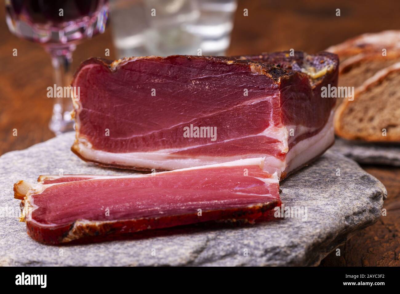 South Tyrolean bacon on granite Stock Photo