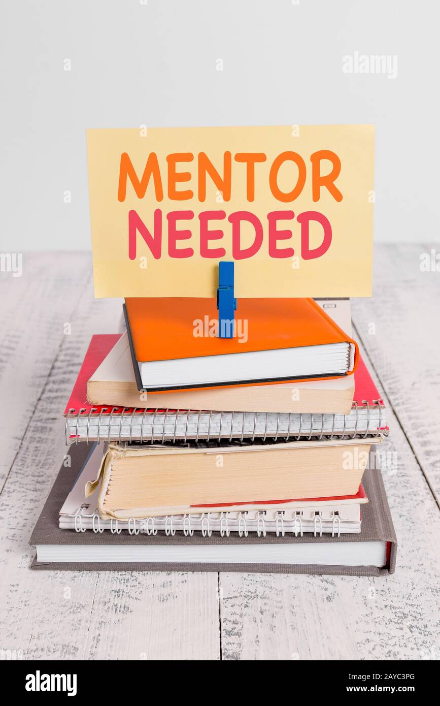 Conceptual hand writing showing Mentor Needed. Business photo text wanted help for more experienced or more knowledgeable demons Stock Photo
