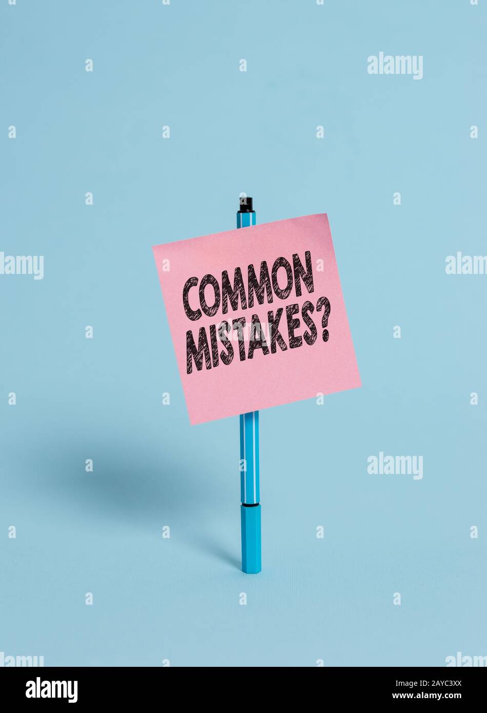 Handwriting text Common Mistakes Question. Concept meaning repeat act or judgement misguided making something wrong Ballpoint bl Stock Photo