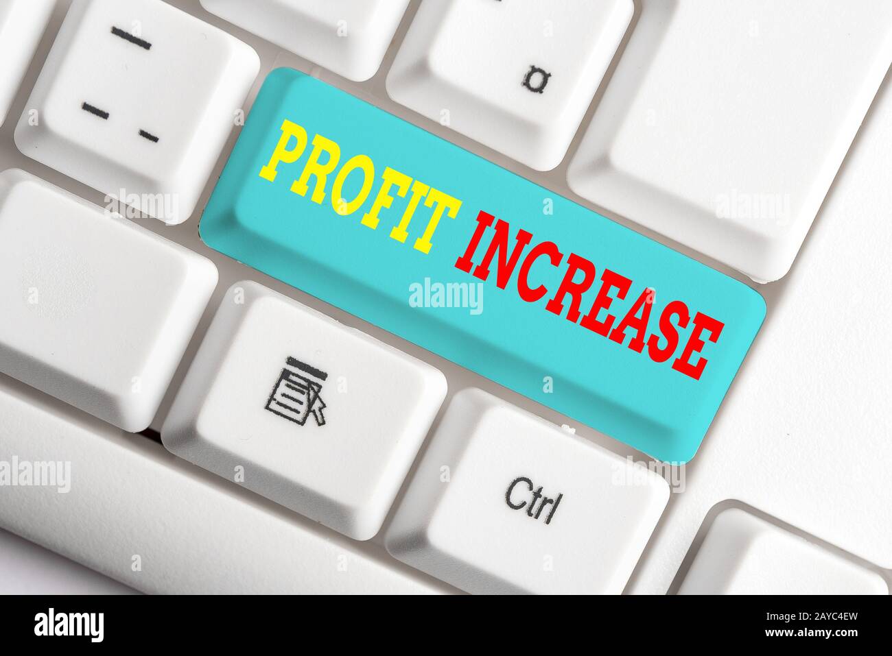 Text sign showing Profit Increase. Conceptual photo the growth in the amount of revenue gained from a business White pc keyboard Stock Photo