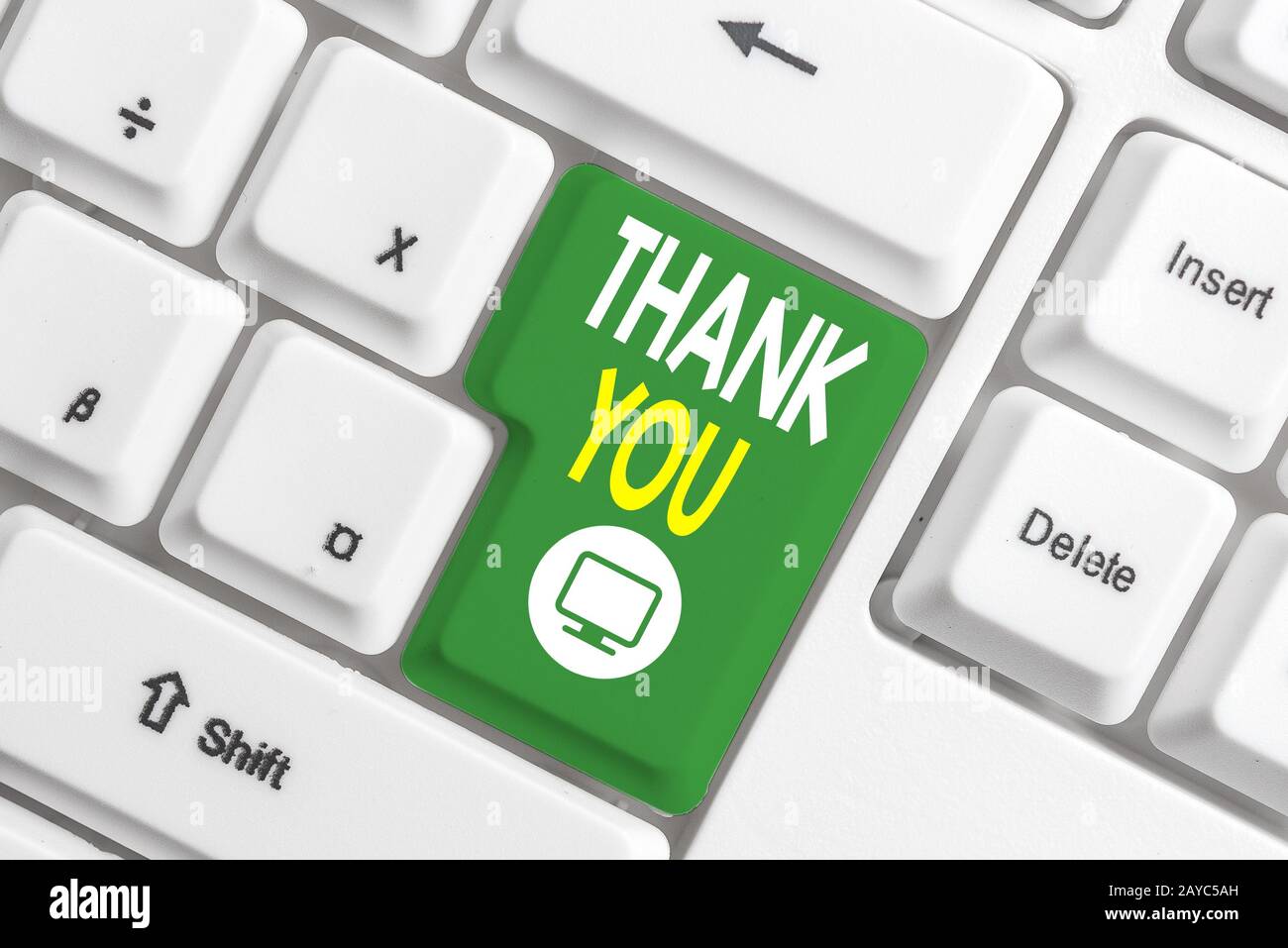 Text sign showing Thank You. Conceptual photo a polite expression used when acknowledging a gift or service White pc keyboard wi Stock Photo