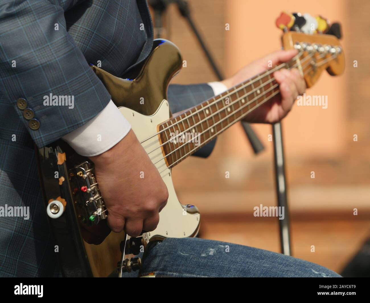 musician hand playing bass guitar Stock Photo Alamy