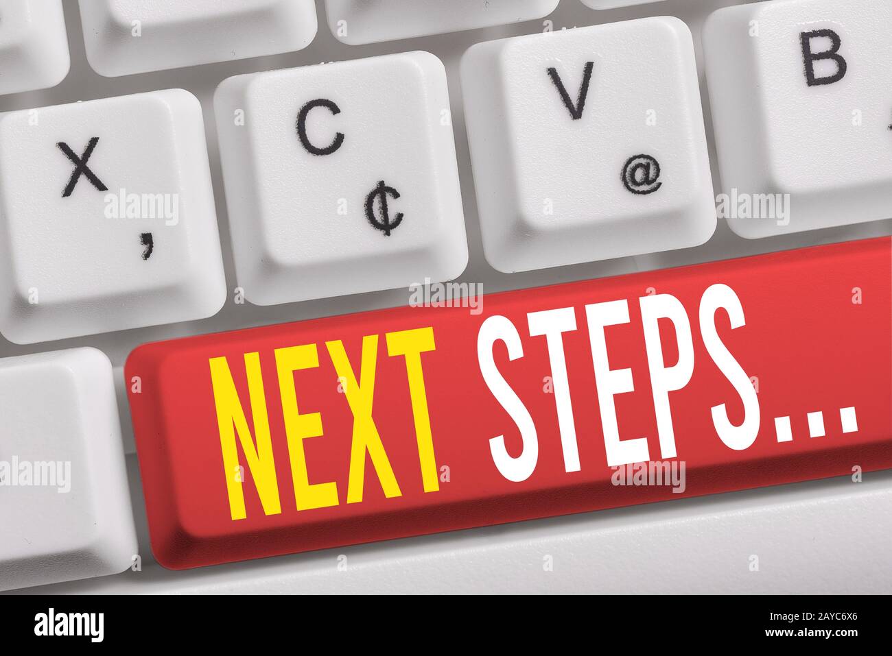 Word writing text Next Steps. Business concept for something you do or plan after you ve finished something else White pc keyboa Stock Photo