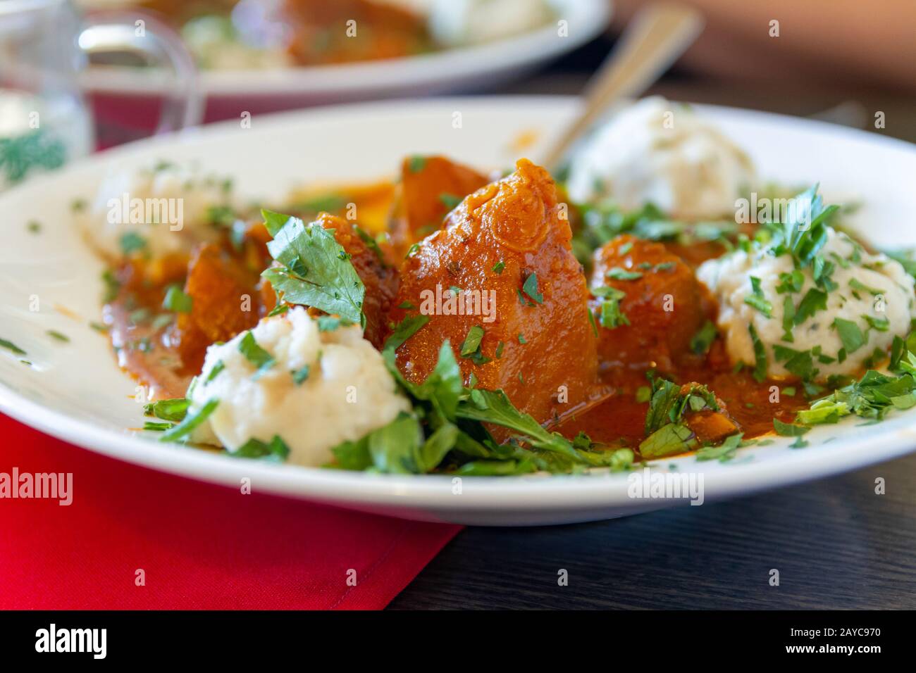 Eating vegetable pumpkin goulash in a austrian or german restaurant
