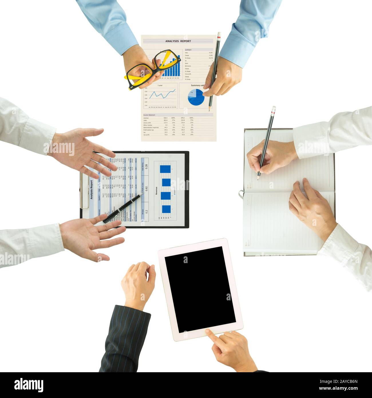 Top view of group of business people working on an office desk. Stock Photo