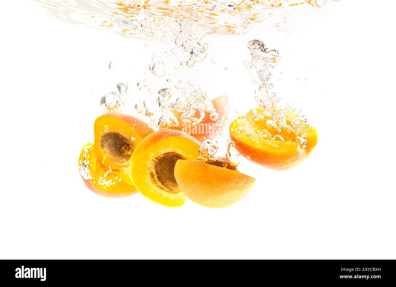 Fresh Nectarine with water splash over white background Stock Photo