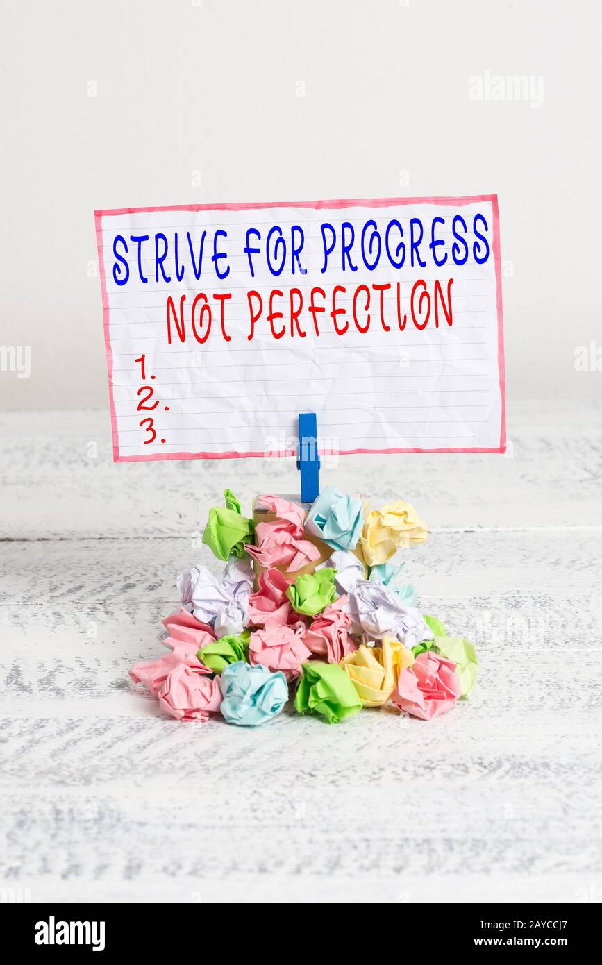 Conceptual hand writing showing Strive For Progress Not Perfection. Business photo text Improve with flexibility Advance Grow Re Stock Photo