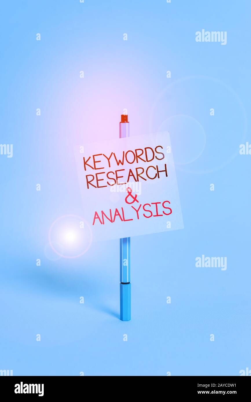 Text sign showing Keywords Research And Analysis. Conceptual photo search for data and create tables graphs Ballpoint blank colo Stock Photo
